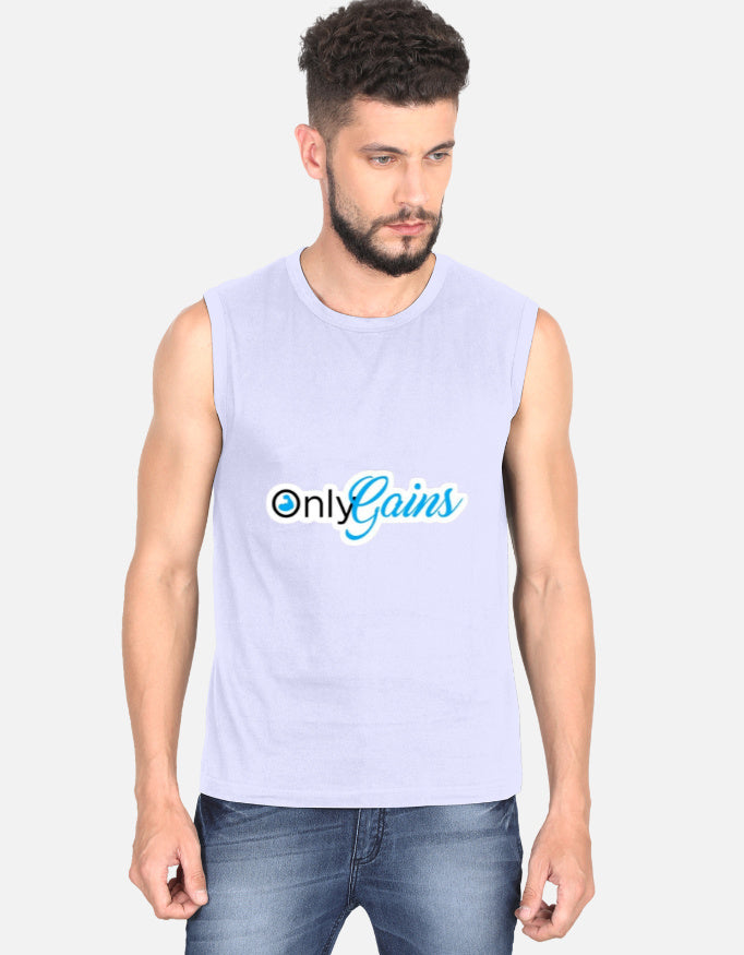 A man wearing a sleeveless light lavender-gray tank top with the text 'Only Gains' printed on the chest in blue and black, paired with blue jeans, against a light gray background.