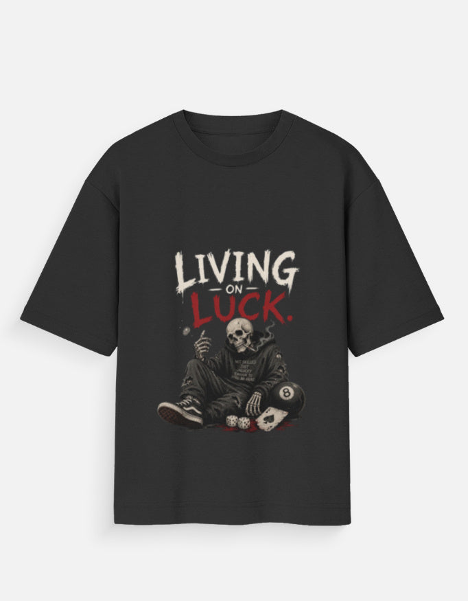 Black t-shirt with a skeleton graphic and 'Living on Luck' text on a white background