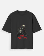 Black t-shirt with compass design and 'Create Your Own Path' text on a beige background