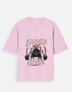 Pink t-shirt with graphic design and text on a white background