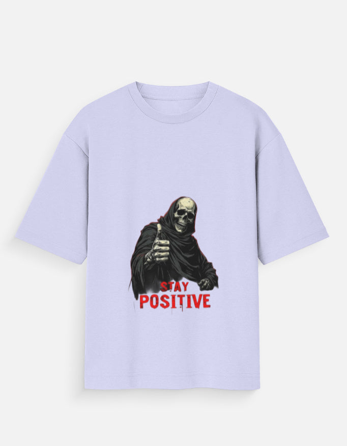 Light purple t-shirt with a graphic of a skeleton and 'Stay Positive' text on a white background