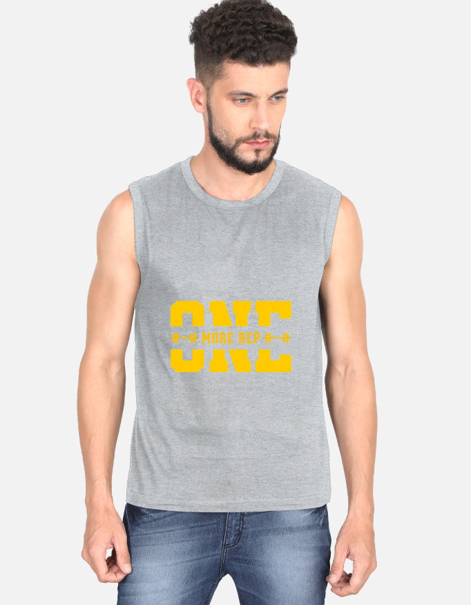 Man wearing a sleeveless gray shirt with yellow text on a white background