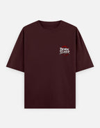 Maroon t-shirt with 'Demon Slayer' logo on a white background