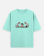 Mint green t-shirt with graphic design on a white background