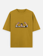 Mustard yellow t-shirt with graphic design on a white background