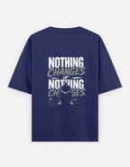 Navy blue t-shirt with motivational quote on the back against a white background