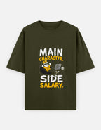 Olive Green t-shirt with a graphic and text 'Main Character. Side Salary.' on a white background