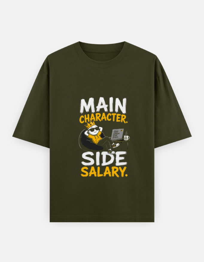 Olive Green t-shirt with a graphic and text 'Main Character. Side Salary.' on a white background
