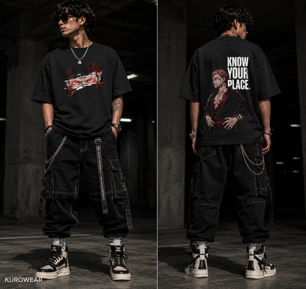 A model shown in a split front-and-back view wearing a black graphic T-shirt, black cargo pants, and black-and-white sneakers in a dark indoor setting. The shirt features a red-and-white graphic on the front and bold white text reading 'KNOW YOUR PLACE.