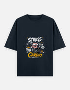 A dark blue short-sleeve t-shirt with a graphic on the chest that reads 'STRESS IS MY CARDIO.' in white and yellow text, featuring a cartoon character in a heart-shaped helmet, shown against a light gray background.