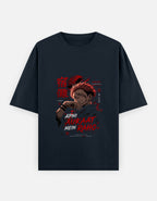 A dark navy blue short-sleeve t-shirt with a graphic print of the anime character Satoru Gojo from Jujutsu Kaisen, featuring red Japanese text and English text, displayed on a light gray background.