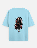 A light blue short-sleeve t-shirt with a large graphic print of the anime character Itachi Uchiha on the front, set against a plain light gray background.