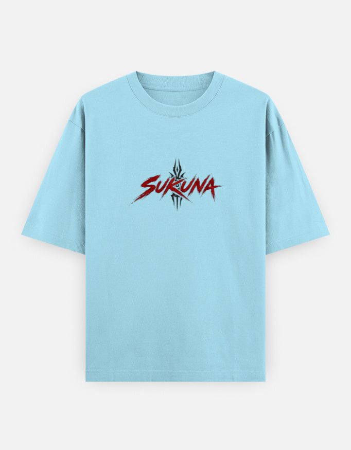 A light blue short-sleeve t-shirt with a red and black stylized 'SUKUNA' graphic printed on the chest, displayed against a light gray background.