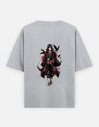 A light gray heather crewneck t-shirt featuring a graphic print of an anime character in a black and red cloak with black birds on the chest, displayed against a light gray background.