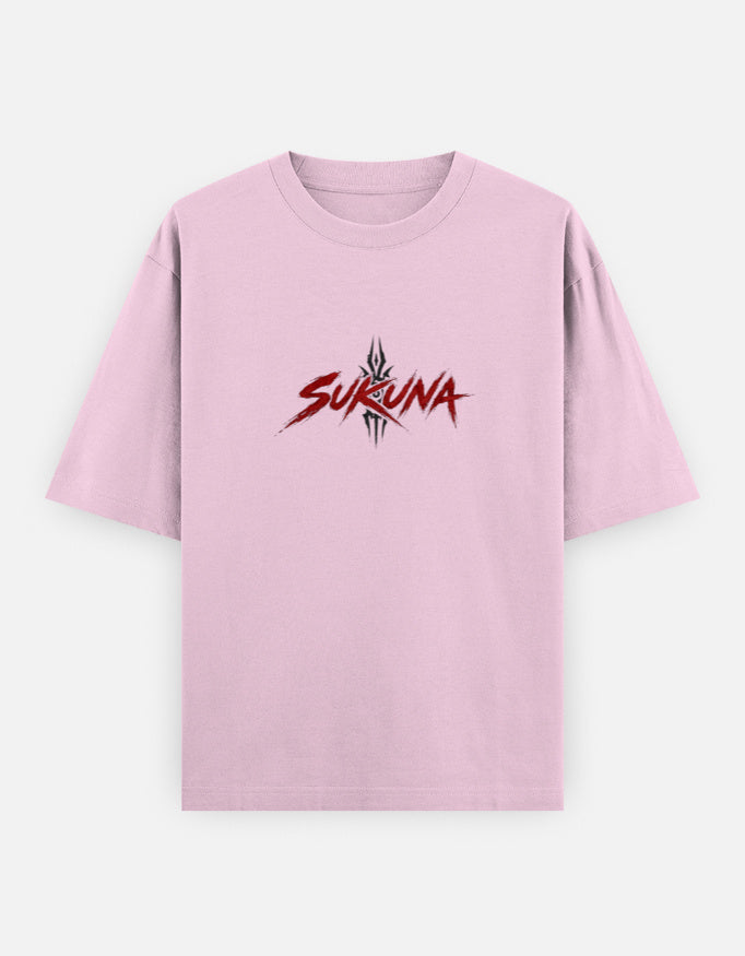 A light pink short-sleeve t-shirt with a red and black 'SUKUNA' graphic printed on the chest, displayed against a light gray background.