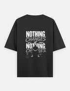 Black oversized back print t-shirt featuring the motivational quote "Nothing Changes If Nothing Changes" in a bold vintage typography design by Kurowear.