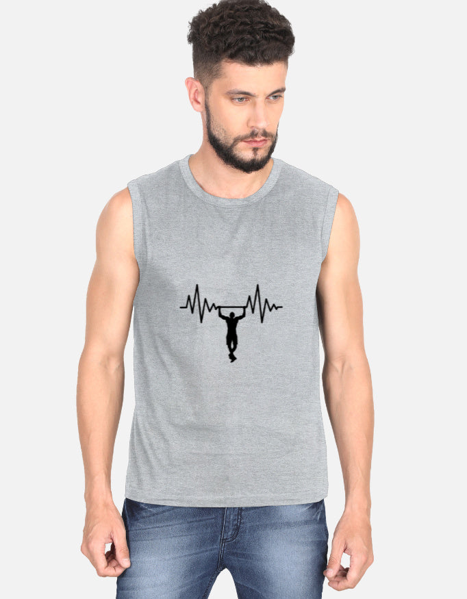 Man wearing a sleeveless gray shirt with a black graphic design on a white background